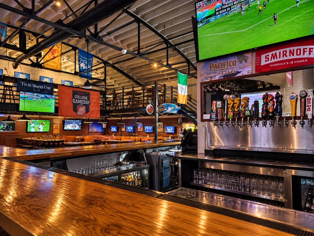 Sports on the TVs above the bar at The Tavern